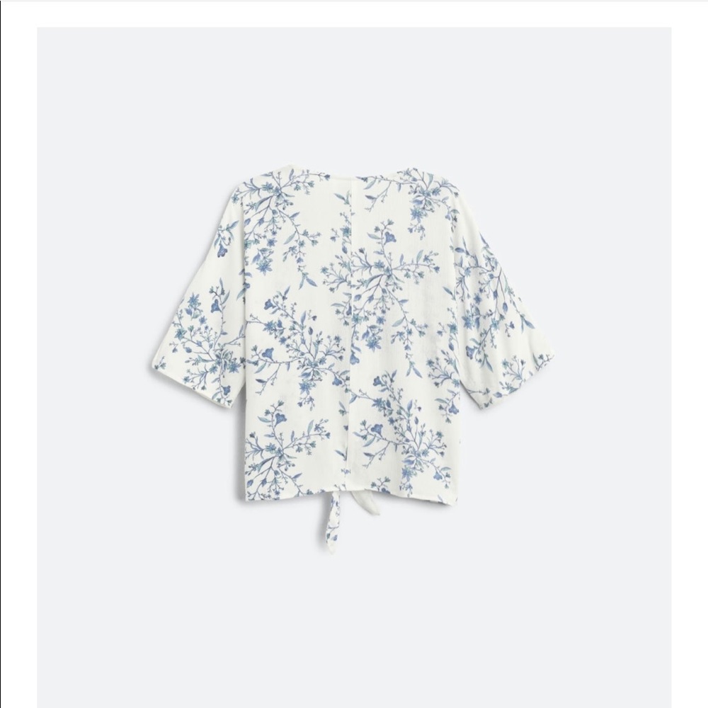 LUQ white blue flowered shirt with tie front. Worn once. Size M.